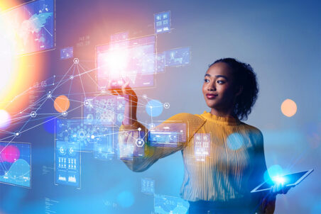 Photo for 'AI's Disruptive Potential in Business' - Woman of color with iPad, interacting with 3D display. Highlights real-world AI engagement in business.
